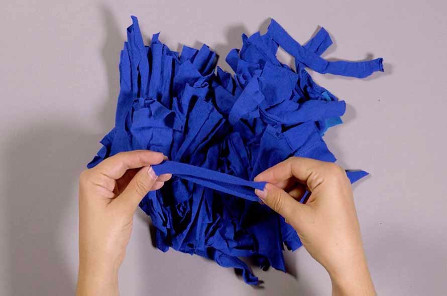 Pieces of a jumper being tied together