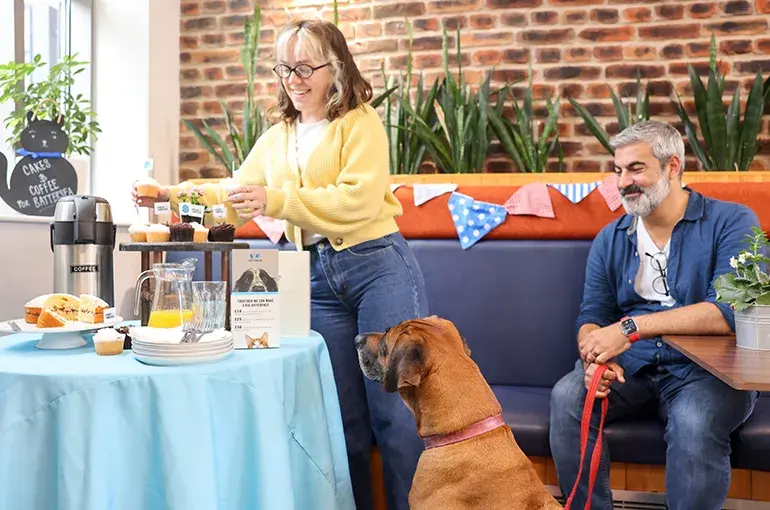 People fundraising at a small event